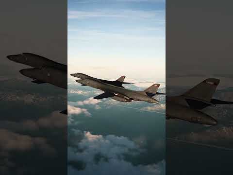 Two US B-1B strategic bombers are buzzed by Russian Su-27 fighter jets over the Baltic sea
